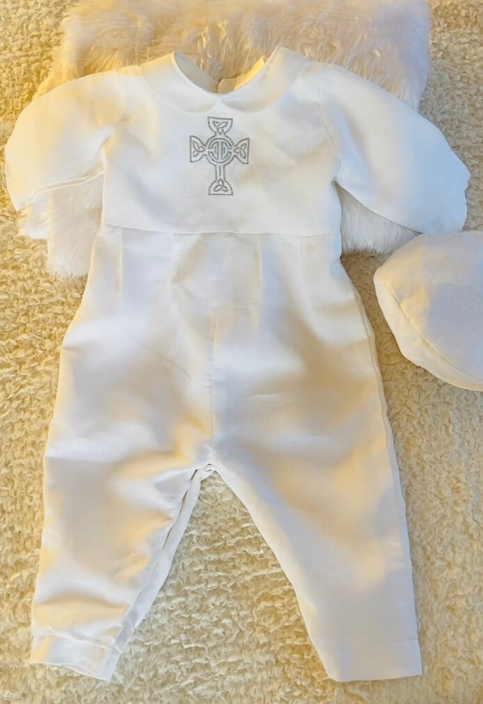 christening romper and flat cap